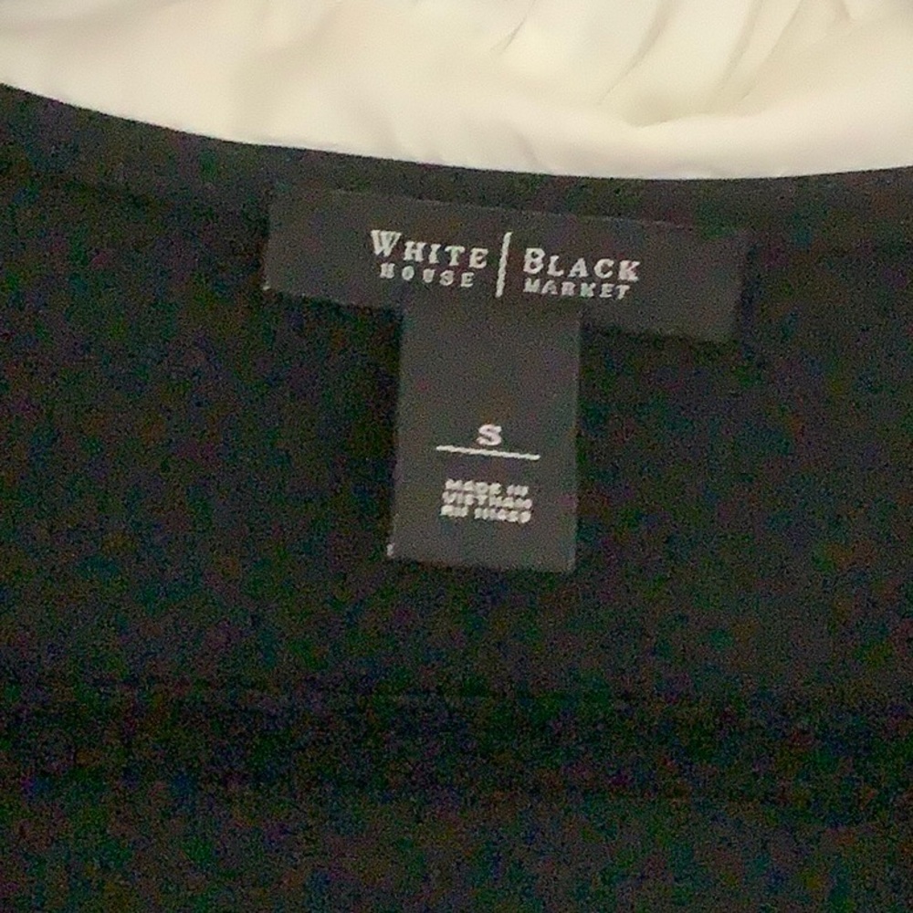 White House black market black top with white ruffled neck and sleeves. - Picture 3 of 6